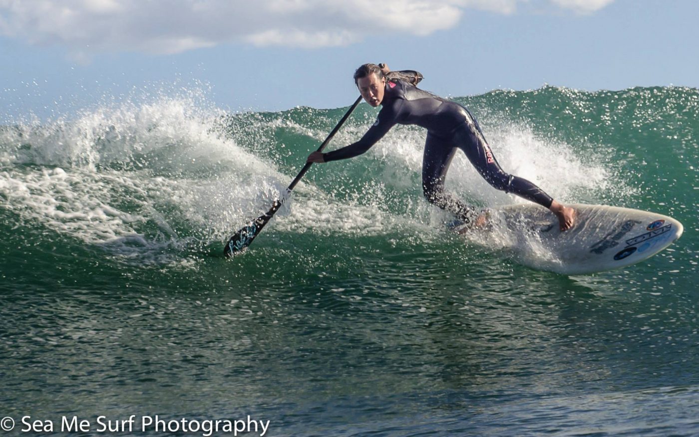 Kristiana surfing