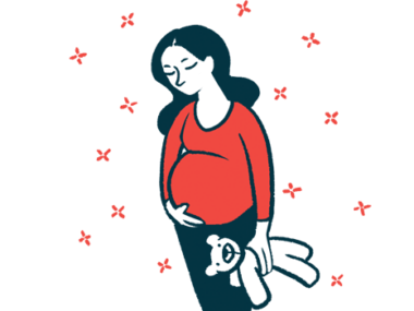 A pregnant woman touches her belly with one hand and holds onto a plush animal with the other.